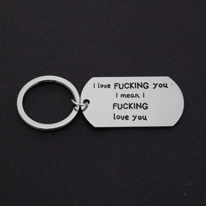 Polished stainless steel dog tag keychain with engraved sentimental text for couples