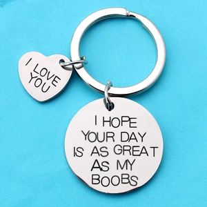 Polished stainless steel heart keychain set with humorous engraved slogan for couples