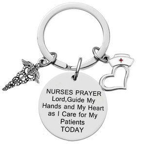 Nurse prayer keychain with medical caduceus and nursing hat charms in polished silver steel