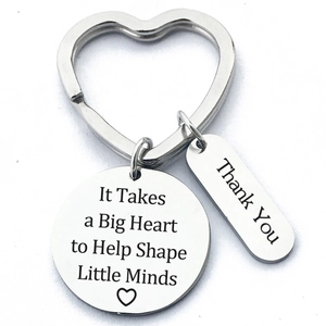 Close-up of heart-shaped ring stainless steel keychain with teacher appreciation text