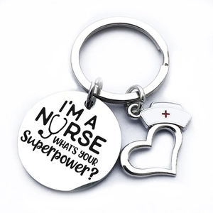 Porte-clés infirmière en acier inoxydable avec pendentif rond et breloque coeur