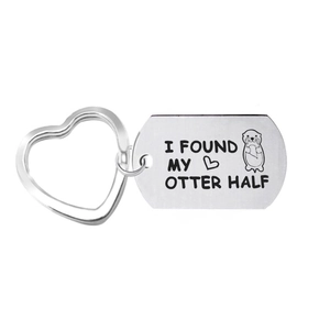 Custom silver heart keychain with engraved otter half quote on a metal rectangle tag
