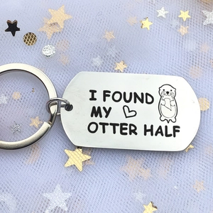 Polished stainless steel otter keychain with I Found My Otter Half engraving for couples