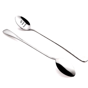 Close-up of stainless steel long handle spoons with mirror finish and engraved text