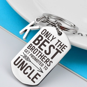 Polished stainless steel Uncle keychain with heart shield pendant and letter K charm