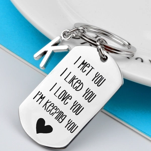 Polished stainless steel keychain with K initial and I MET YOU emotional engraving