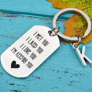 Stainless steel keychain engraved with romantic quotes and a letter K pendant for couples