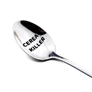 Polished stainless steel cereal killer spoon with creative engraving and silver finish