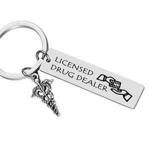 Stainless steel keychain with Caduceus charm and Licensed Drug Dealer engraving for doctors