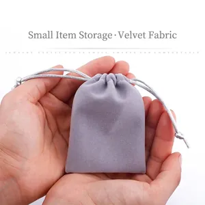 Soft grey velvet drawstring jewelry pouch for aunt keychain gift storage and protection