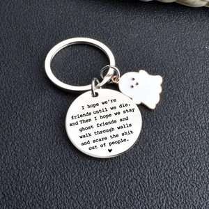 Stainless steel ghost keychain with 'friends until we die' engraving on black leather