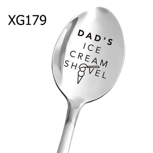 Detailed macro view of Father's Day stainless steel spoon with Dad's Ice Cream engraving