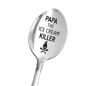 Macro detail of Papa The Ice Cream Killer engraved on polished stainless steel spoon