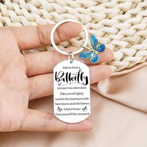 Stainless steel butterfly keychain with blue enamel charm and engraved inspirational tag