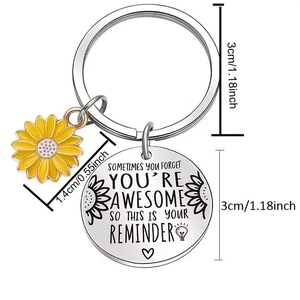 Portachiavi in acciaio inox con girasole e ciondolo rotondo con incisione motivazionale