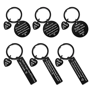 Detail of 6pcs black stainless steel keychains with thank you heart and inspiring text