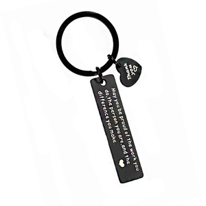 Black stainless steel keychain with engraved quote and heart charm for office gift