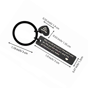 Polished stainless steel keychain with engraved inspirational quotes and heart charm