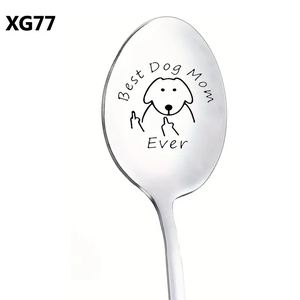 Detail view of engraved Best Dog Mom Ever stainless steel spoon with dog cartoon art