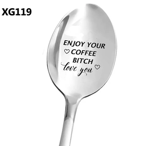 Polished stainless steel coffee spoon engraved with 'ENJOY YOUR COFFEE BITCH' heart text