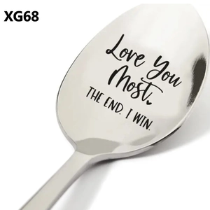 Close-up of a 410 stainless steel spoon with an engraved 'Love You Most' message