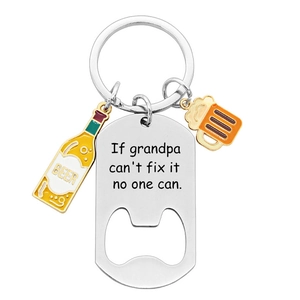 Detailed view of Father's Day keychain with bottle opener and grandpa engraving