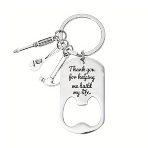 Detail of Father's Day stainless steel keychain featuring tools and engraved quote