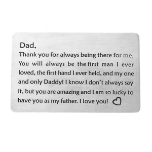 Detailed view of brushed stainless steel wallet insert card with laser engraved message