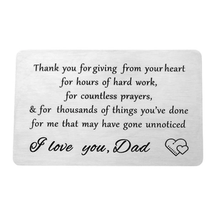 Detailed view of silver wallet insert card with brushed metal and Father's Day engraving