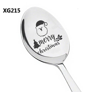 Close-up of stainless steel spoon with laser engraved Merry Christmas tree and Santa