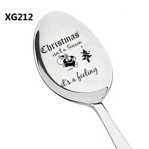 Detail of laser engraved stainless steel spoon with Christmas quote and icons