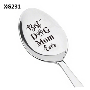 Polished silver stainless steel spoon engraved with Best Dog Mom Ever and paw print
