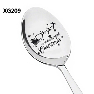 Detailed macro view of laser engraved Christmas elk and reindeer on stainless steel spoon