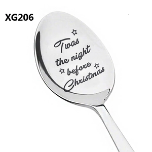 Detail of stainless steel spoon featuring laser-engraved Twas the night before Christmas text