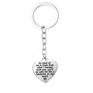 Polished stainless steel heart keychain with an engraved message for teacher appreciation