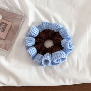 Chic knit scrunchie with blue and coffee color blocking for elegant bun hairstyles
