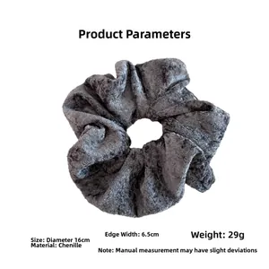 Detail of 16cm grey chenille scrunchie with soft velvet texture and elastic band
