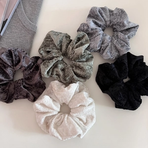 5-piece soft velvet scrunchie set in assorted neutral colors for elegant hairstyles