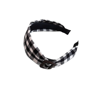 Vintage black and white checkered headband with brown buckle for high skull top styling