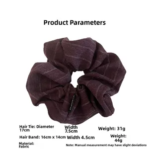 Deep purple textured fabric scrunchie with stripes, 17cm diameter and 7.5cm width detail