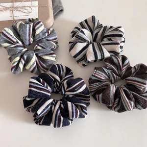 Vintage American style soft knitted striped scrunchies in four classic colors