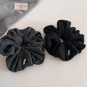 Elegant large gray and black wool-like scrunchies with rabbit charms and text labels