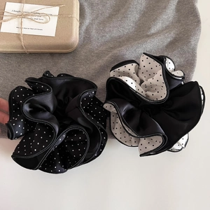 Set of two black and white polka dot satin hair scrunchies with elegant four-layer piping