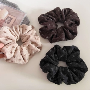 Floral knit scrunchies set in beige, coffee, and grey with snowflake patterns