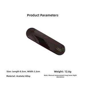 Detailed view of dark tortoiseshell acetate hair clip with 8.5cm by 2.3cm dimensions