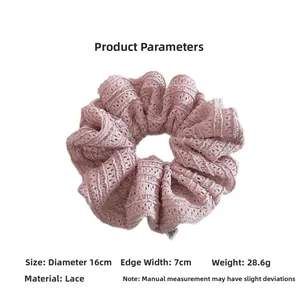 Pink lace scrunchie detail with hollow floral pattern and size dimensions 16cm diameter