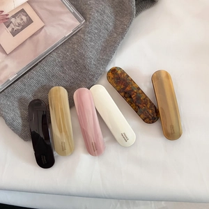 Detailed set of 6 acetate hair clips in neutral colors with France Handmade engraving
