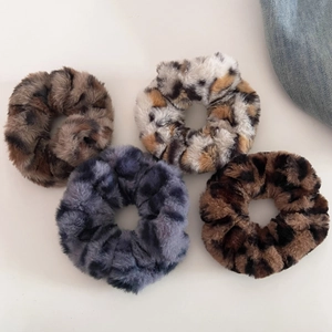 Set of four plush leopard print hair scrunchies in assorted vintage colors for women