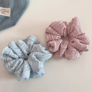 Set of two hollow lace scrunchies in light blue and pink colors for sweet hair styling