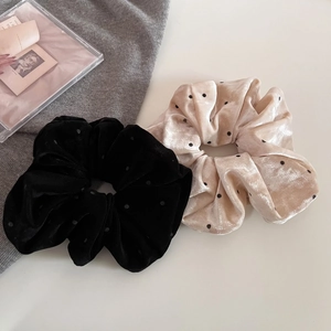 Eleganti elastici in velluto con motivo a pois e trama liscia e lucida in due colori